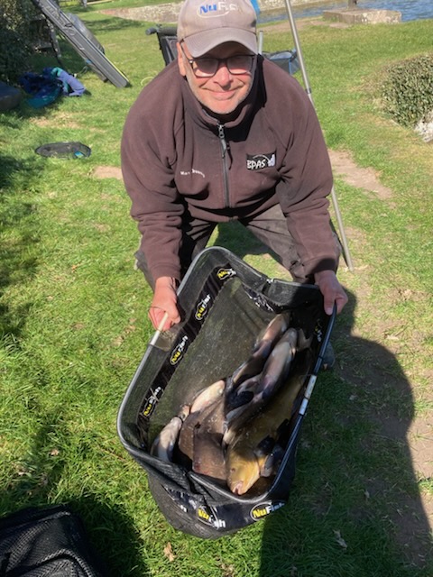 A happy Mark Greening with his winning catch.